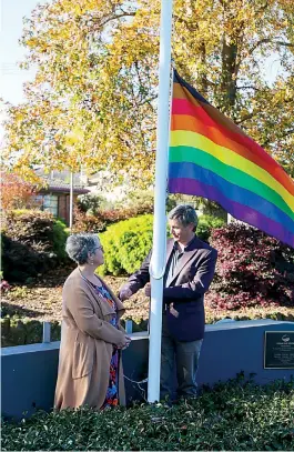  ?? ?? Baw Baw Shire mayor Annemarie McCabe and deputy mayor Michael Leaney raise the pride flag for IDAHOBIT Day last week.