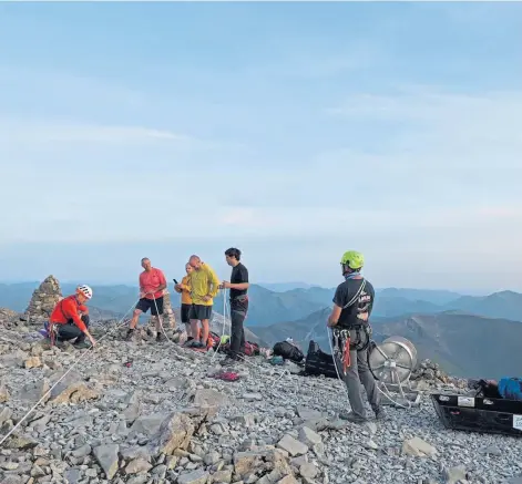  ??  ?? RELIEF: Lochaber Mountain Rescue Team in action during the long operation on Thursday.