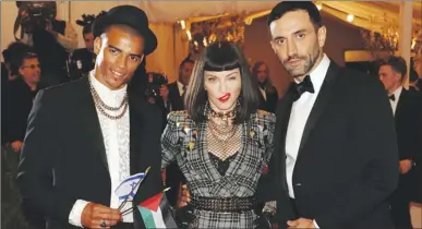  ?? PICTURE: AP ?? ‘HANDICAP’: Brahim Zaibat, left, Madonna and designer Riccardo Tisci attend The Metropolit­an Museum of Art’s Costume Institute benefit, celebratin­g ‘PUNK: Chaos to Couture’, in New York in May.