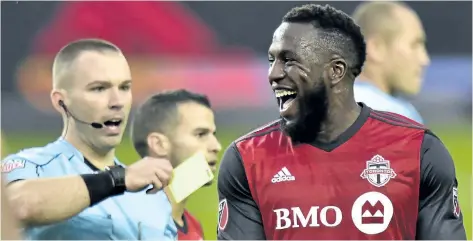  ?? FRANK GUNN/THE CANADIAN PRESS ?? Toronto FC forward Jozy Altidore reacts after receiving a yellow card Sunday against the New York Red Bulls.