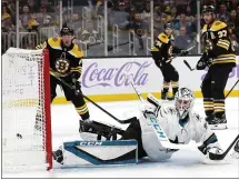  ?? WINSLOW TOWNSON — THE ASSOCIATED PRESS ?? Sharks goalie Martin Jones is beaten for a goal by Boston’s David Pastranak (not pictured) in the first period of Tuesday’s 5-1loss.