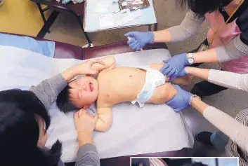  ?? ELAINE THOMPSON/ASSOCIATED PRESS ?? One-year-old Abel Zhang cries as he receives the last of three inoculatio­ns, including a vaccine for measles, mumps and rubella (MMR), at the Internatio­nal Community Health Services last week in Seattle. A recent measles outbreak has sickened dozens of people in the Pacific Northwest, most in Washington state. Washington Gov. Jay Inslee declared a state of emergency over the outbreak last month.