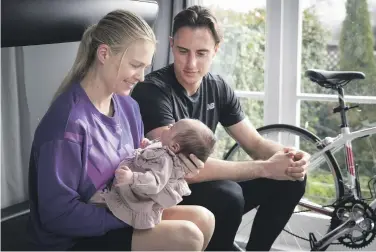  ?? KELLY HODEL/WAIKATO TIMES ?? Camille and Cameron French with then 6-week-old Sienna in 2022. His family also help out with childmindi­ng.