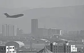  ?? AFP VIA GETTY IMAGES ?? A U.S. Air Force plane takes off from the military airport Friday in Kabul, Afghanista­n.