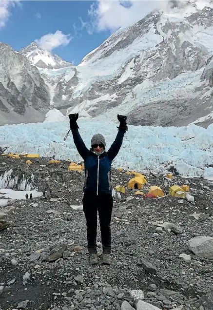  ?? SUPPLIED ?? Stacey Hitchcock celebrates reaching Everest Base Camp in Nepal.