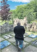  ?? COURTESY OF BLAINE COURTNEY ?? Former Emancipati­on Day festival chair Blaine Courtney takes a knee at Owen Sound’s Black History Cairn, focal point of the festival and touchstone for the community.