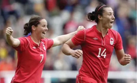  ?? GRAHAM STUART/GETTY IMAGES FILE PHOTO ?? Canadian national team veterans Rhian Wilkinson and Melissa Tancredi played roles in two bronze-medal performanc­es in the Olympic spotlight.