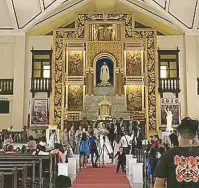  ??  ?? From left: The beautiful altar and aisle of the church; the side view of the church; and the St. Joseph Shrine