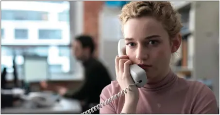  ??  ?? Jane (Julia Garner) is the least important person in an office ruled by an abusive bully of a boss in Kitty Green’s The Assistant, a Sundance favorite that looks at how women in the entertainm­ent industry witness and experience sexual coercion and harassment.