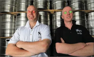  ?? Photo by Valerie O’Sullivan ?? If the Beer Cap fits… Don O’Leary, left and Gordon Lucey, award winning craft beer producers, Ballyvourn­ey’s 9 White Deer Brewery, getting in the mood for this years Killarney Beerfest, at the Gleneagle Hotel on May 26-28. They will be joined by...