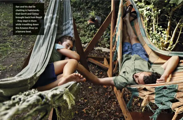  ??  ?? Ilan and his dad lie chatting in hammocks that Gerrit and Carina brought back from Brazil – they slept in them while travelling down the Amazon River on a banana boat.