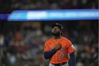  ?? JULIO CORTEZ — THE ASSOCIATED PRESS ?? Houston Astros starting pitcher Cristian Javier walks toward the dugout after throwing against the Texas Rangers during the first inning in Game 3 of the baseball American League Championsh­ip Series Wednesday, Oct. 18, 2023, in Arlington, Texas.