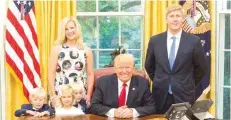  ?? — Reuters ?? US President Donald Trump and Vice President’s Chief of Staff Nick Ayers and his wife Jamie Floyd with their children in The Oval Office.