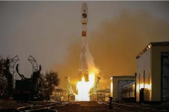  ??  ?? The satellite launches in Kazakhstan by a Soyuz rocket yesterday (EPA)