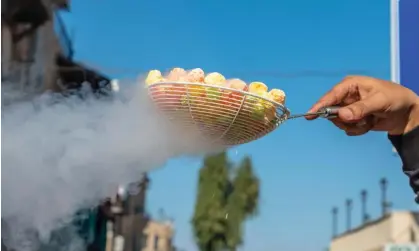  ?? Photograph: Daniel Reiner/Alamy ?? Dragon’s Breath, a snack dipped in liquid nitrogen, causes vapour to billow out of the eater’s nose and mouth. Popularise­d on TikTok, Indonesia’s health ministry has warned of its dangers after some children suffered burns.