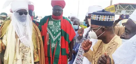  ??  ?? The Emir of Kano, Alhaji Aminu Ado Bayero (left) with the Group Managing Director/CEO of KAM Holding Dr. Kamoru Yusuf (2nd right) and other traditiona­l chiefs, during the monarch’s arrival at the Ilorin Internatio­nal Airport in Kwara State