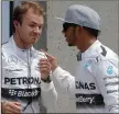  ??  ?? NO WAY, NICO: Rosberg with a suitably impressed Hamilton