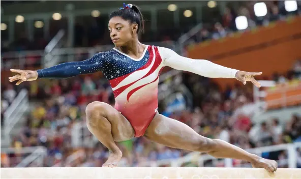  ?? TYLER ANDERSON ?? U.S. gymnast Simone Biles, who won three gold medals and a bronze at the 2016 Olympics in Rio de Janeiro, displayed speed, power, strength, agility and flexibilit­y.