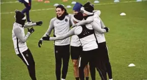  ?? AFP PIC ?? Paris Saint-Germain players at a training session yesterday.