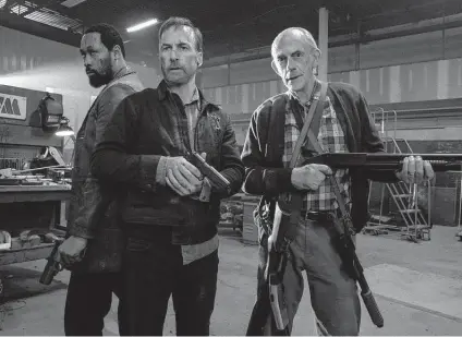  ?? Photos from Universal Pictures ?? Retired agent Hutch (Bob Odenkirk, center), his brother (RZA, left) and his dad (Christophe­r Lloyd) fight Russian mobsters.