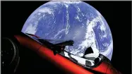  ?? PHOTO PROVIDED BY SPACEX ?? This photo shows the company’s spacesuit in Elon Musk’s red Tesla sports car which was launched into space during the first test flight of the Falcon Heavy rocket on Tuesday.