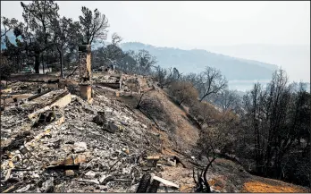  ?? MAX WHITTAKER/THE NEW YORK TIMES ?? The remains of a residence destroyed by a wildfire Aug. 22 in Spanish Flat, California.