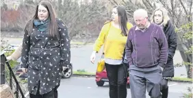  ?? PHOTO: PATRICK BROWNE ?? Tragic: Top, the Alexander family, including Doug Snr, Lily, Doug Jnr and Stephen. Below, relatives of those who died in the accident arrive at the Brandon House Hotel in New Ross for the inquest yesterday.