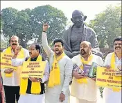  ?? ARVIND YADAV/HT ?? TDP leaders hold a protest demanding special status for Andhra Pradesh at the Parliament complex on Monday.