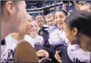  ?? AJ MAST/THE ASSOCIATED PRESS ?? Huskies coach Geno Auriemma, center, is carried off the court by members of his team after beating Syracuse on Tuesday.