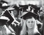  ?? SEAN D. ELLIOT/THE DAY ?? Liberal arts and sciences graduate Zoe Hayn sports cartoon birds on her mortarboar­d during the 53rd commenceme­nt exercises for Three Rivers Community College on Wednesday in Norwich.