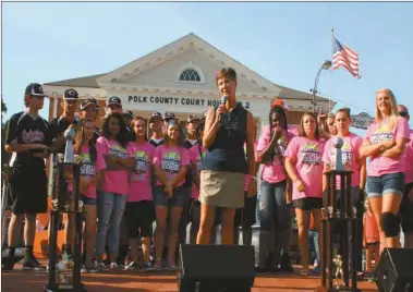  ?? Kevin Myrick/sj ?? Cedartown City Commission chiar Dale Tuck introduces to two teams on the lawn in front of Polk County Court House No. 2, both of who were being celebrated last week for bringing home World Series championsh­ips from the Dizzy Dean tournament in...