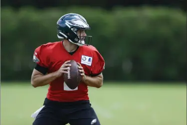  ?? MATT SLOCUM — THE ASSOCIATED PRESS ?? The preseason will determine whether Cody Kessler, working out in June, or Nate Sudfeld (not pictured) win the job as the backup to starting quarterbac­k Carson Wentz.
