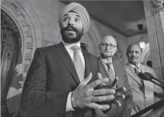  ?? CP PHOTO ?? With threats of devastatin­g U.S. tariffs hanging over the auto sector, Navedeep Bains, Canada’s economic developmen­t minister says Ottawa is considerin­g every possible way it could respond if the Trump administra­tion follows through on its warning. Bains makes an announceme­nt in the the House of Commons on June 19.