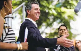  ?? Robert Gauthier Los Angeles Times ?? GOV. GAVIN NEWSOM visits the Hope Street Family Center in August 2019 to promote the state’s investment of $2 billion in early childhood developmen­t.
