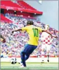 ?? AFP ?? Brazil forward Neymar scores the opening goal in their friendly with Croatia at Anfield in Liverpool on June 3.