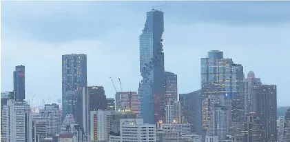  ?? PATTARACHA­I PREECHAPAN­ICH ?? MahaNakhon is a mixed-use skyscraper developed by Pace Developmen­t. SCB is offering Pace’s projects for sale to pay off its debts to the bank.