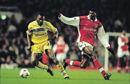  ?? Photo: Ben Radford/ Getty Images ?? Opportunit­y: Lucas Radebe (above left) is one of the few South Africans who have played in the English Premier League. Several of the boys who have won scholarshi­ps to Pinetown Boys’ High School through the British Football Academy (left, in red) in action at their inaugural match against Kusekhaya Football Aces.