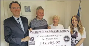  ??  ?? Alasdair Allan MSP, left, with Tony Robson, Janet Paterson and Emma Fraser from the Western Isles Lifestyle Lottery.