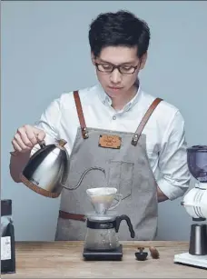  ?? PHOTOS PROVIDED TO CHINA DAILY ?? Clockwise: Guo Yi-fan, a coffee shop owner from Taichung, Taiwan, makes filter coffee at a workshop he started in Fuzhou, Fujian province. Guo Yi-fan packs coffee for medical workers in Fuzhou. Chen Wen-cheng, a community volunteer from Changhua, Taiwan, prepares community entry permits for residents in Beijing.