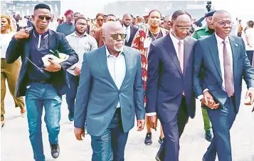  ?? ?? Lagos State Governor, Babajide Sanwo- Olu ( right); Board Chairman, Lekki Port LFTZ Enterprise Limited, Biodun Dabiri; and Director, Lekki Port, Bode Oyedele, during a ceremony to mark the arrival of CMA CGM Scandola, the largest LNG- powered vessel, at Lekki Freeport Terminal, Lekki Port, Ibeju Lekki, Lagos… yesterday.