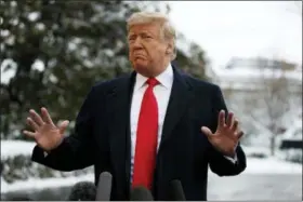  ?? EVAN VUCCI — THE ASSOCIATED PRESS ?? President Donald Trump talks with reporters on the South Lawn of the White House before departing for the American Farm Bureau Federation’s 100th Annual Convention in New Orleans, Monday in Washington.