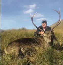  ??  ?? Graham managed to bag this stag. The real trophy animals are reserved for select English clients.