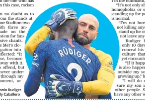  ??  ?? Team support: Antonio Rudiger is embraced by Willy Caballero