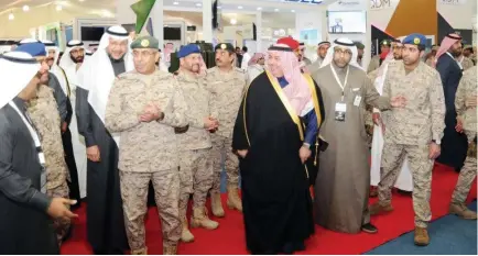  ??  ?? KACST President Prince Dr. Turki bin Saud bin Mohammed Al-Saud takes a tour of the exhibition following the inaugurati­on of the Fifth Electronic Warfare Conference in Riyadh on Tuesday. (AN photo)