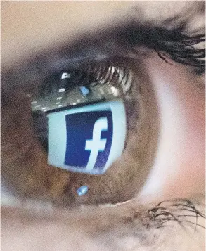  ?? CHRISTOPHE SIMON / AFP / GETTY IMAGES ?? Facebook is relying heavily on artificial intelligen­ce to hold its social networking empire together