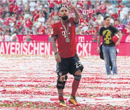  ??  ?? Arturo Vidal celebrates winning the Bundesliga with Bayern Munich in May.