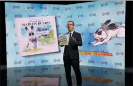  ?? ERIC LIEBOWITZ — HBO VIA AP ?? In this March 2018photo provided by HBO, John Oliver holds the book “Last Week Tonight with John Oliver Presents a Day in the Life of Marlon Bundo.”