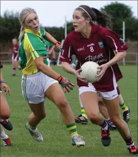  ??  ?? Amy Cardiff of St. Martin’s is closed down by Clongeen’s Sarah Murphy during last year’s Intermedia­te championsh­ip final.