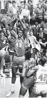  ?? Staff file photo ?? Lorenzo Charles’ dunk for N.C. State in the 1983 national title game is infamous in UH lore.