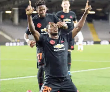  ??  ?? Odion Ighalo joined by his teammates as he celebrates one of his goals for Manchester United.
PHOTO: teamtalk. com